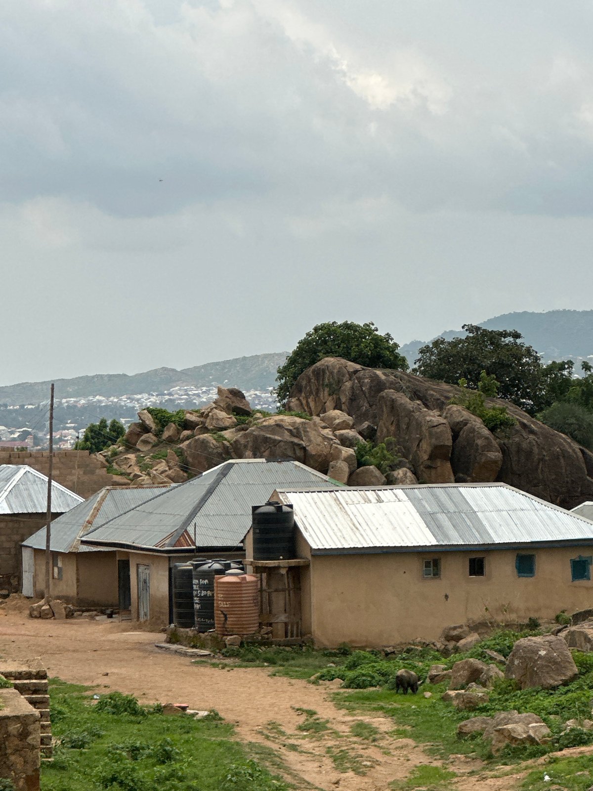 Witness documents Jos Nigeria landscape under overcast afternoon skies