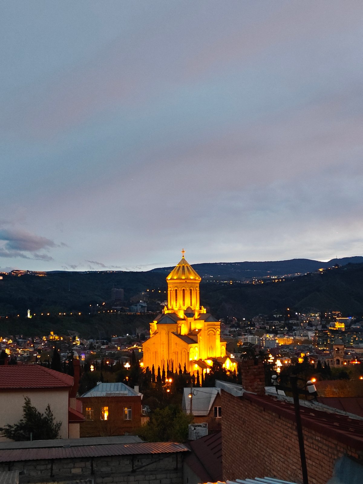 Tbilisi's Holy Trinity Cathedral illuminated at twilight captured