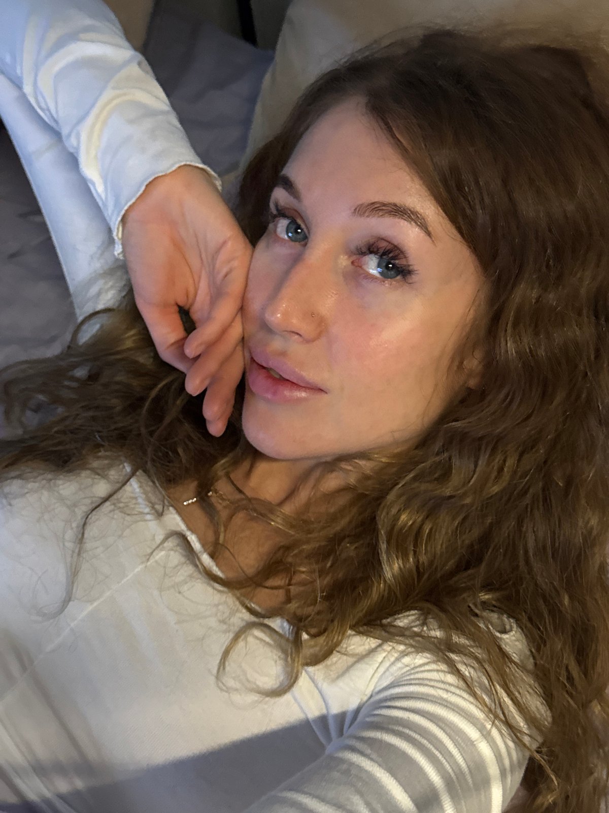 Woman rests with white object in Chaikovsky, Russia