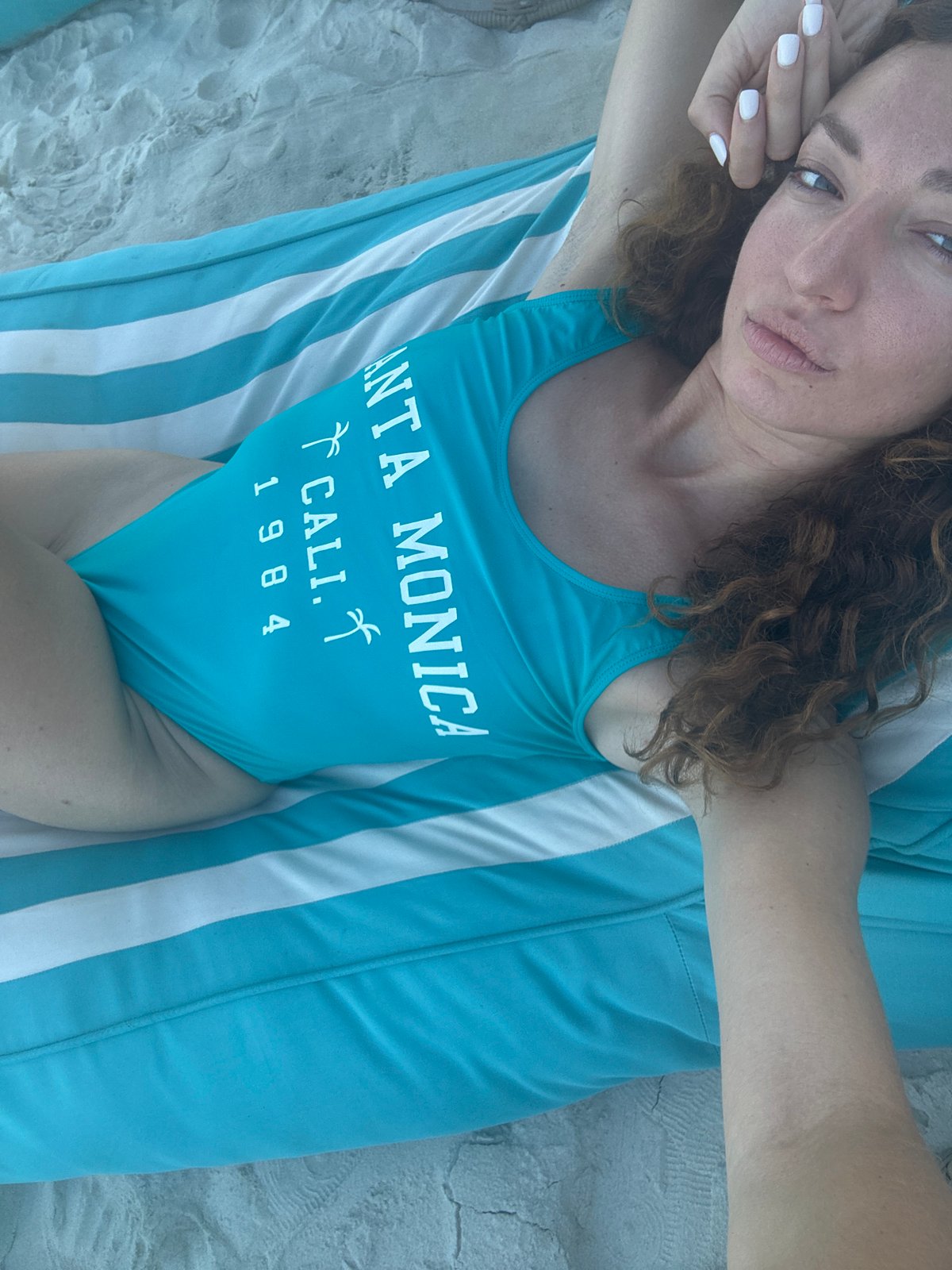 Lounging on a striped beach chair in Ko Samui