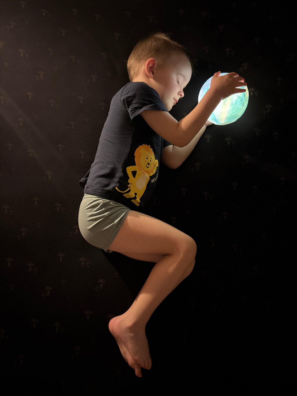 Mother and child share playful moments in Chaikovsky home