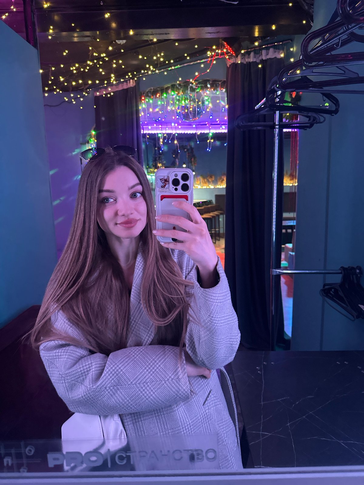 Indoor venue decorations documented in Kazan including disco balls, flowers