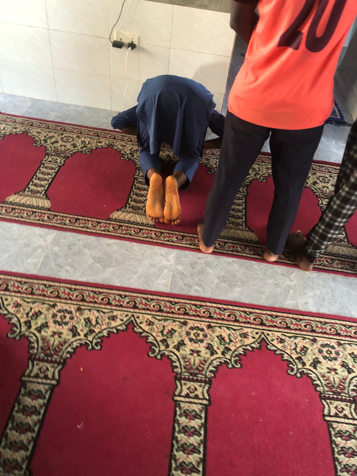 A day in Ado: prayers, street life, and a tailor's workshop