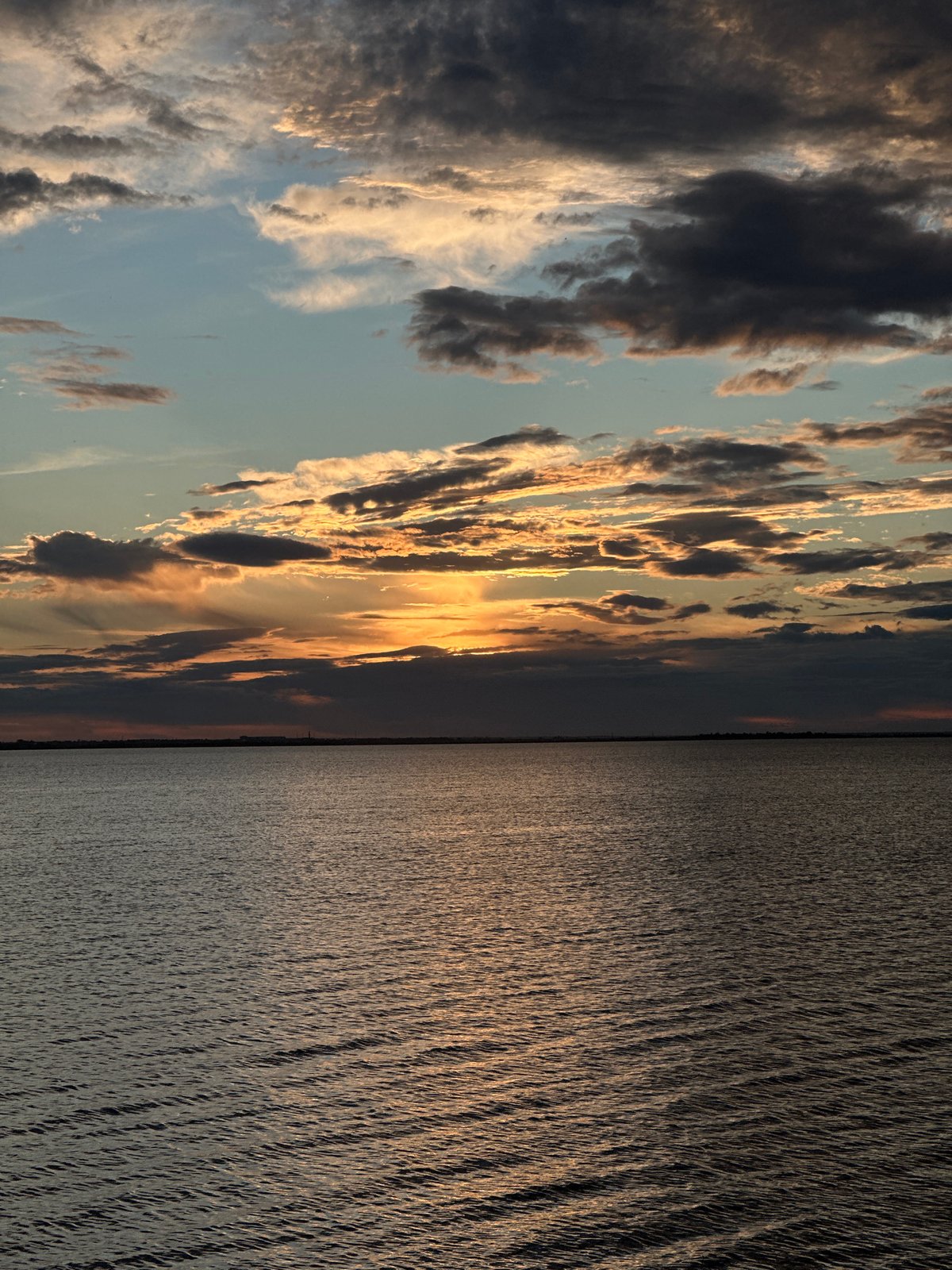 Sunset documented over Lake Kopa in Kokshetau, Kazakhstan