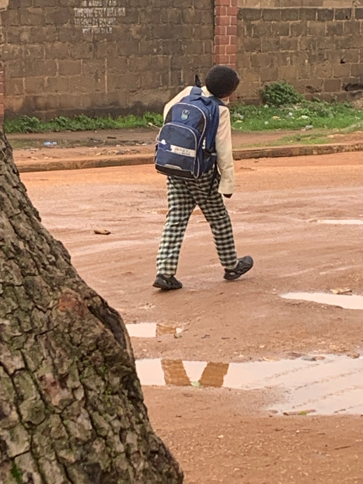 Morning street life in Bukuru, Nigeria — work, school, movement