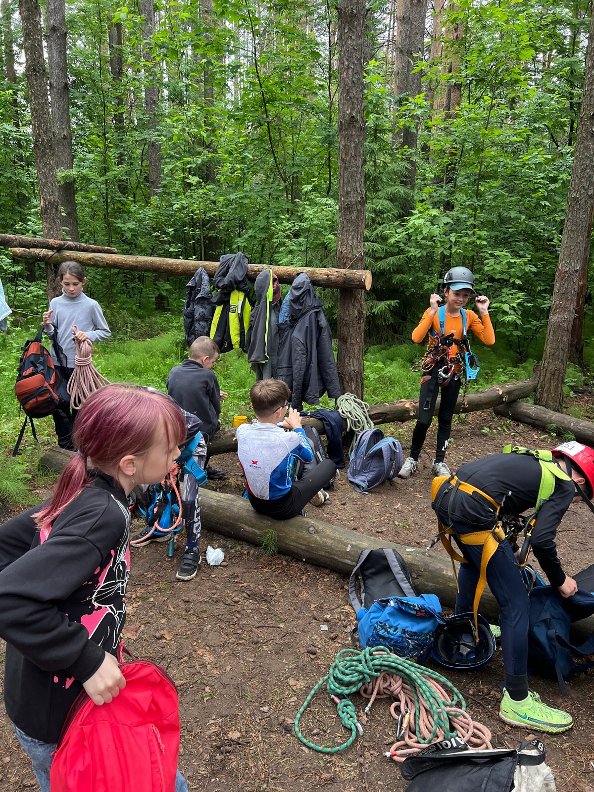 Youth group conducts early morning forest adventure activities in Chaikovsky