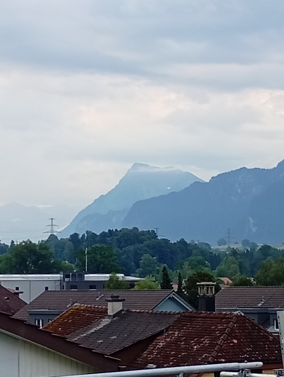 Overcast morning in Wattenwil, solar panels and alpine views