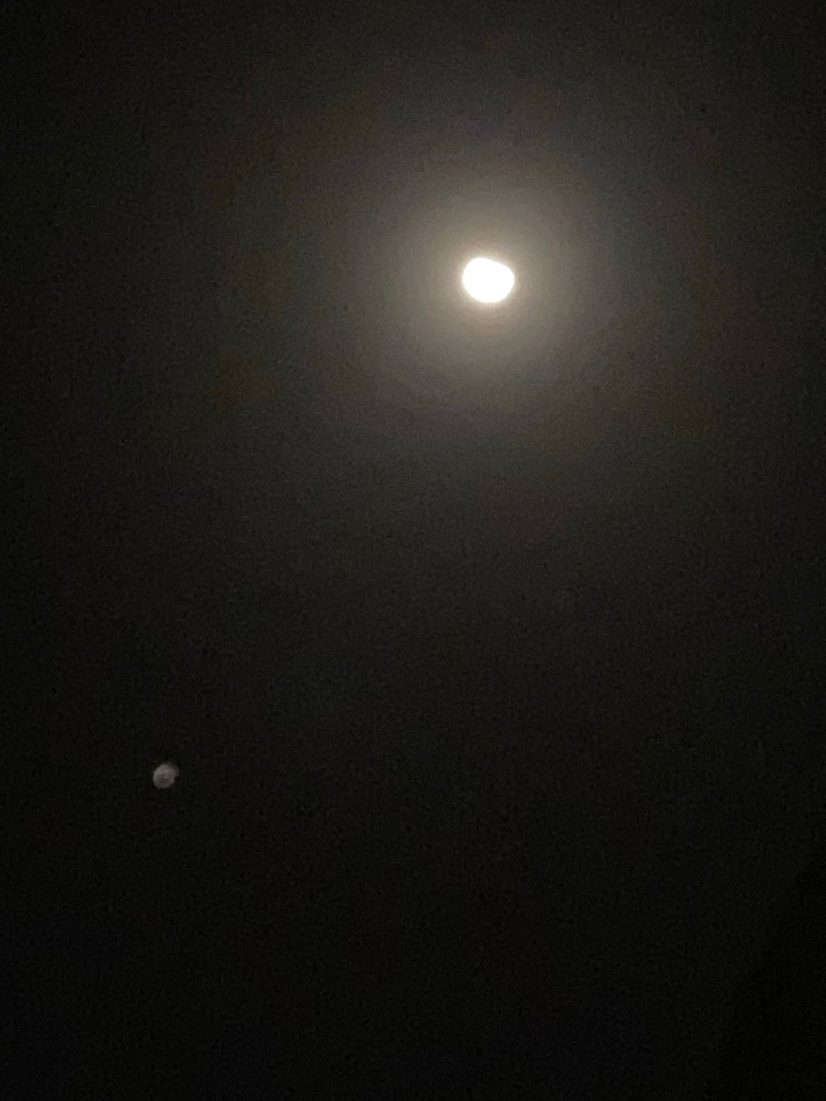 Crescent moon and unidentified object observed in Nigerian night sky