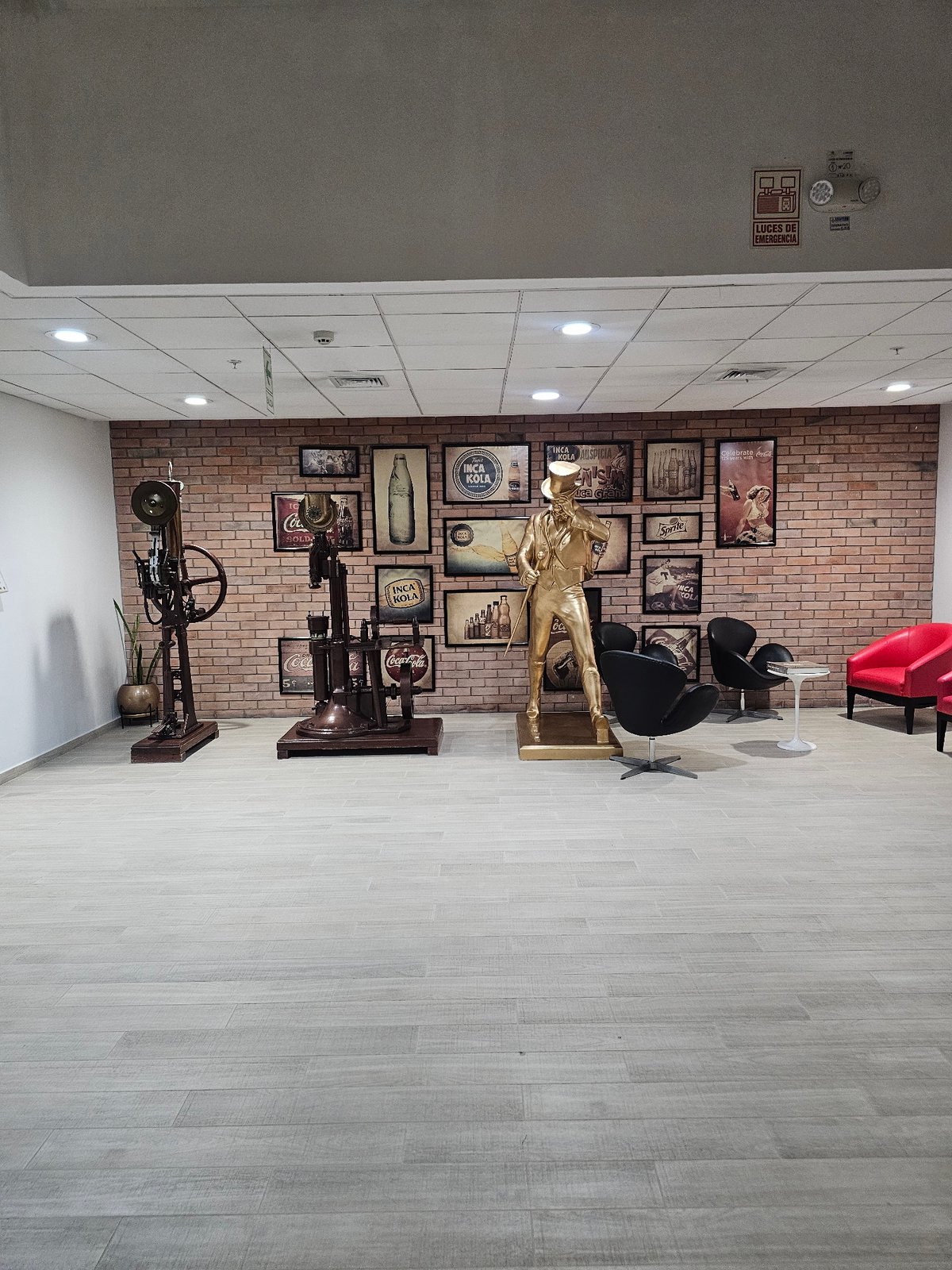 Commercial interior with red brick walls observed in La Molina