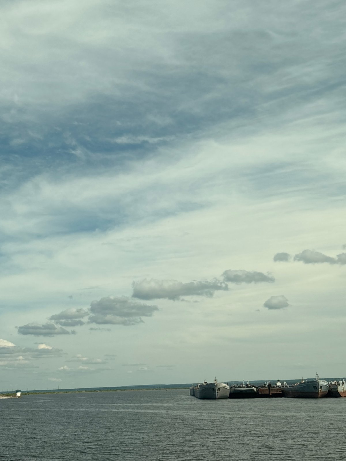 Expansive waterscape and sky documented in Chaikovsky, Russia