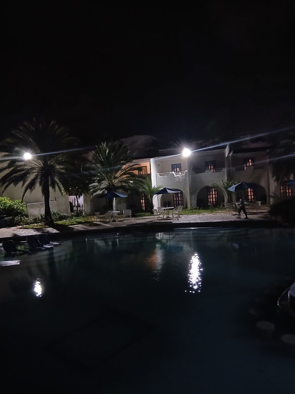 Nighttime waterfront scene captured in Altagracia, Venezuela