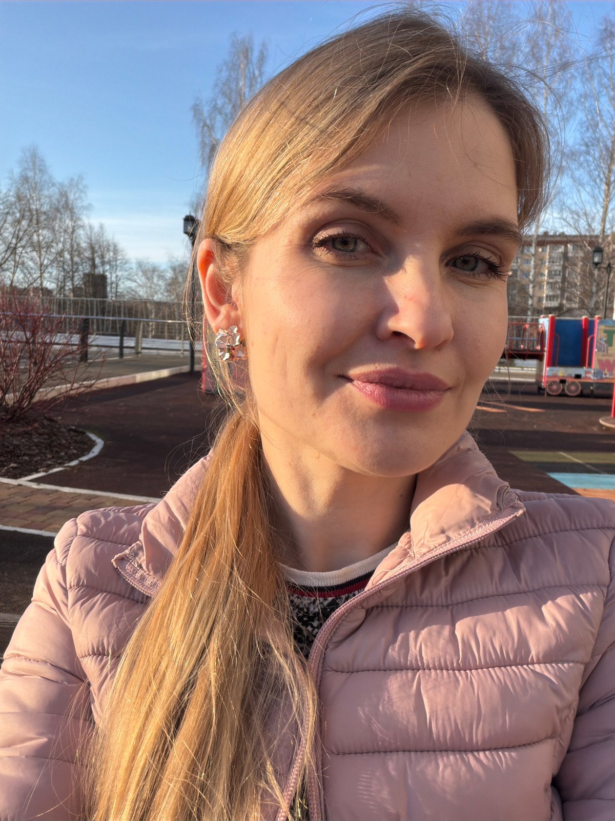 Woman and child spend afternoon at Izhevsk playground