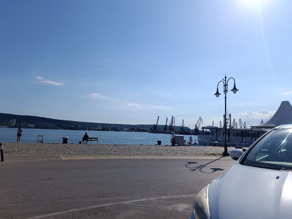 Lunch at a Varna waterfront restaurant, harbor promenade nearby.