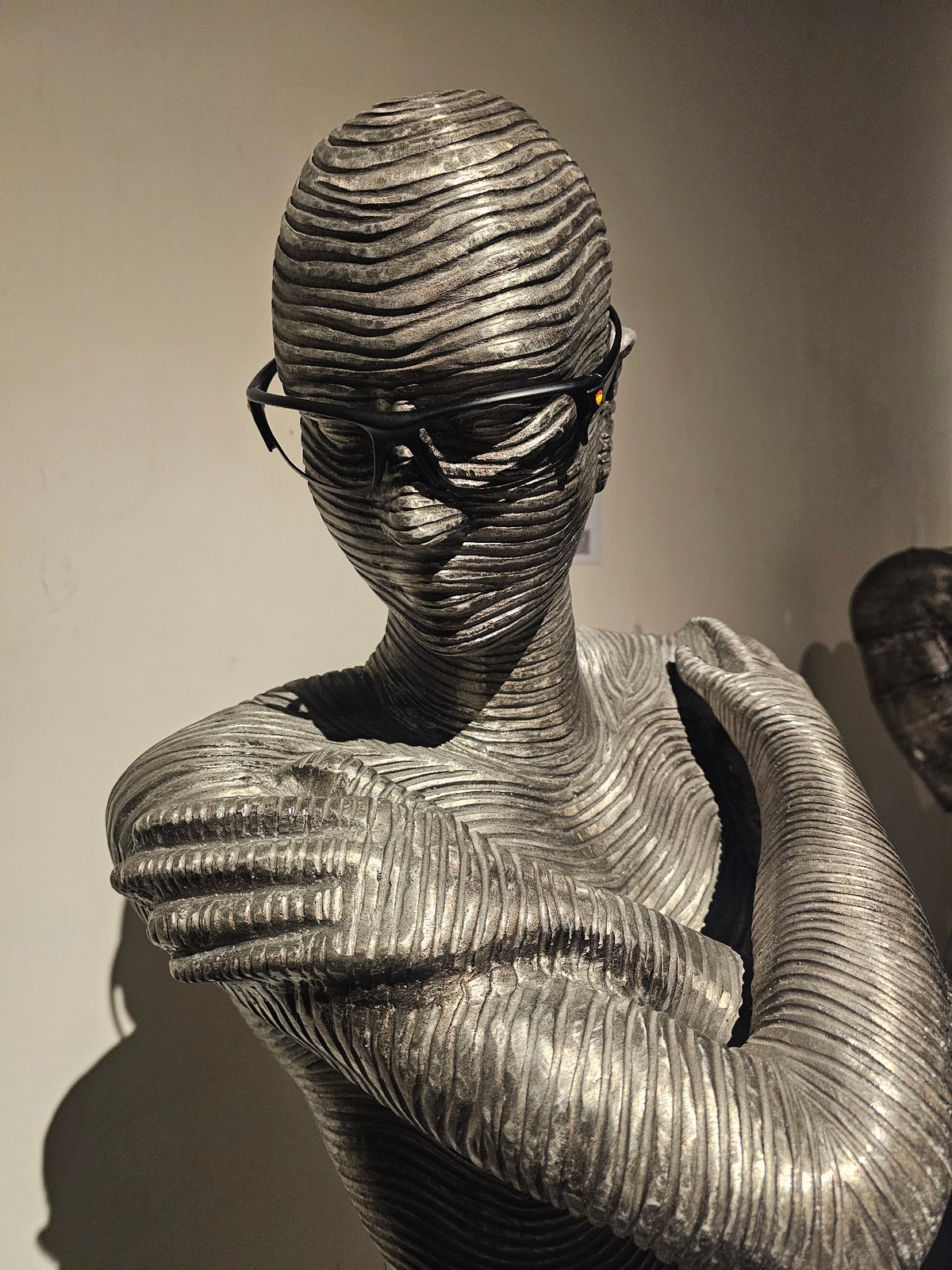 Art sculptures with glasses motif documented across Denpasar