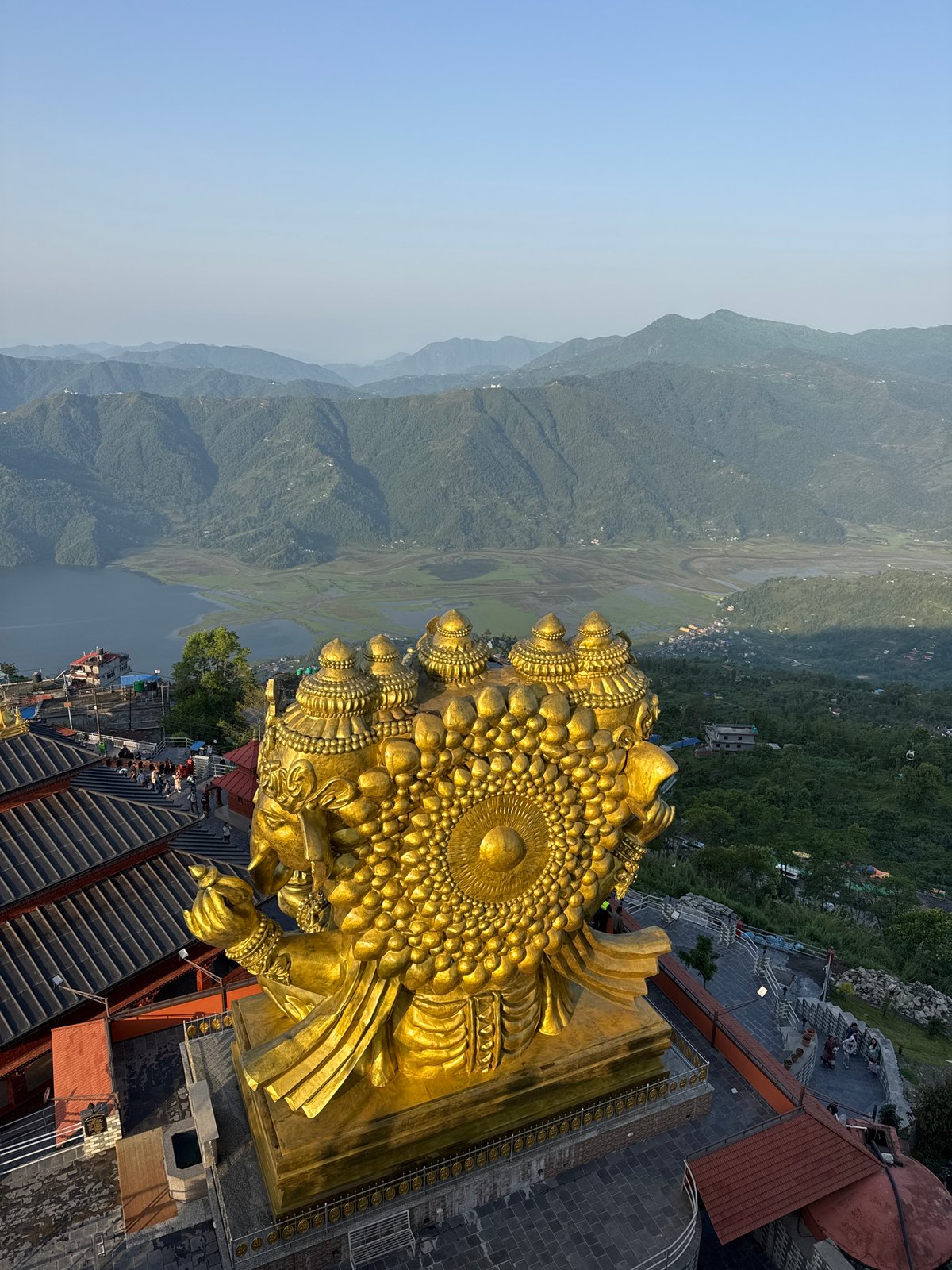 Witness documents aerial views of Pokhara cityscape and statue