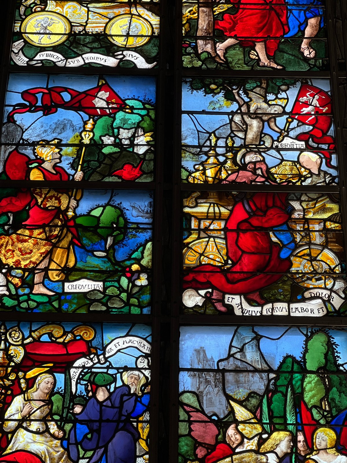 Tourist documents historic Rouen landmarks and stained glass