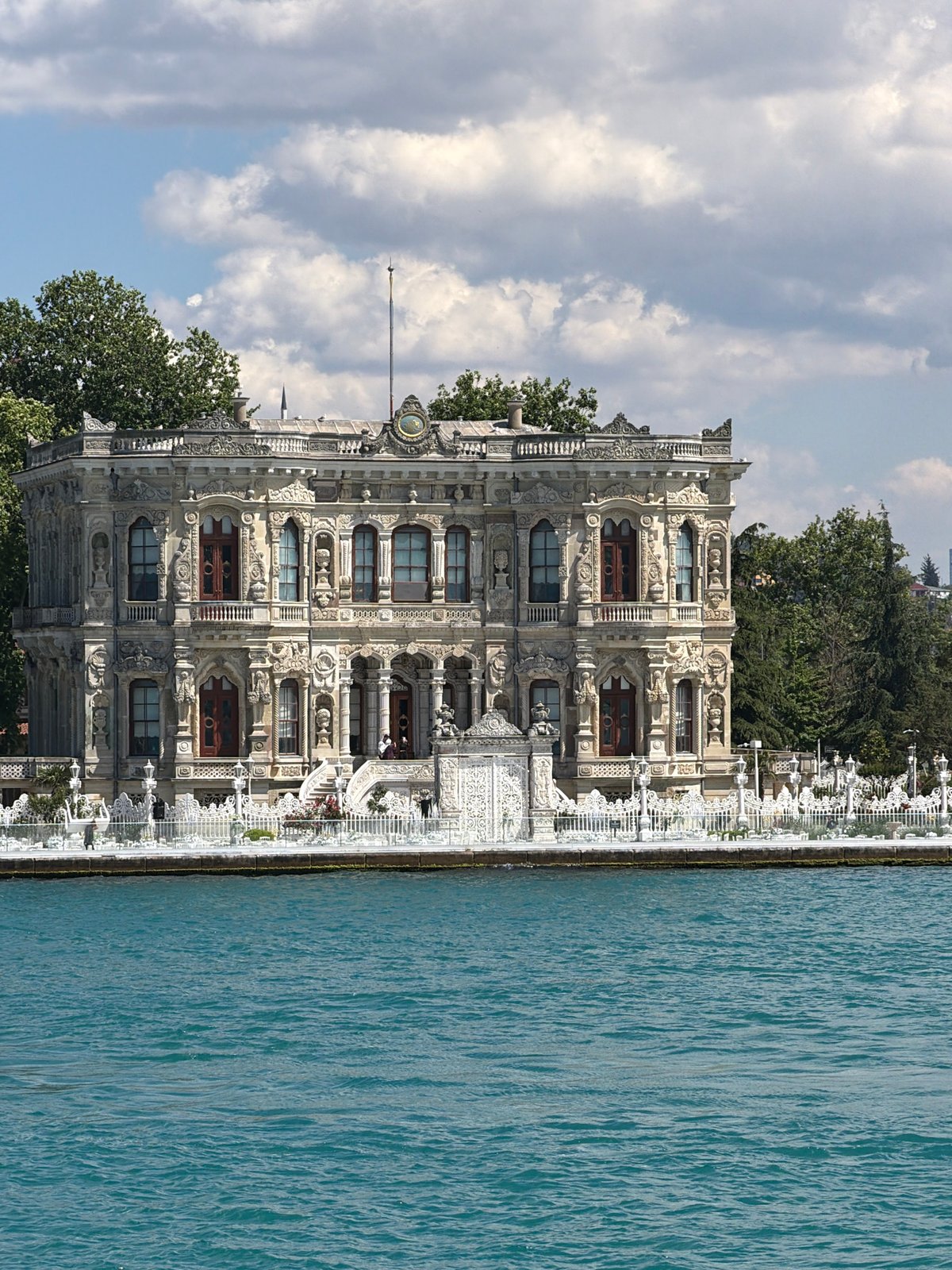 Bosphorus boat tour passes Istanbul's historic waterfront palaces