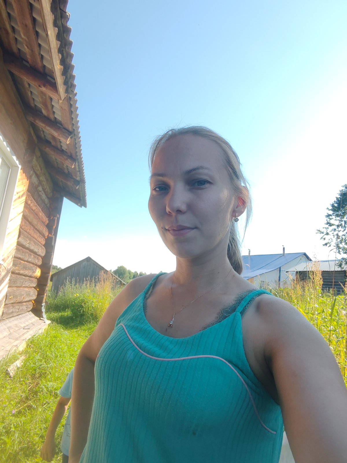 Sunny summer afternoon at a rural Russian homestead