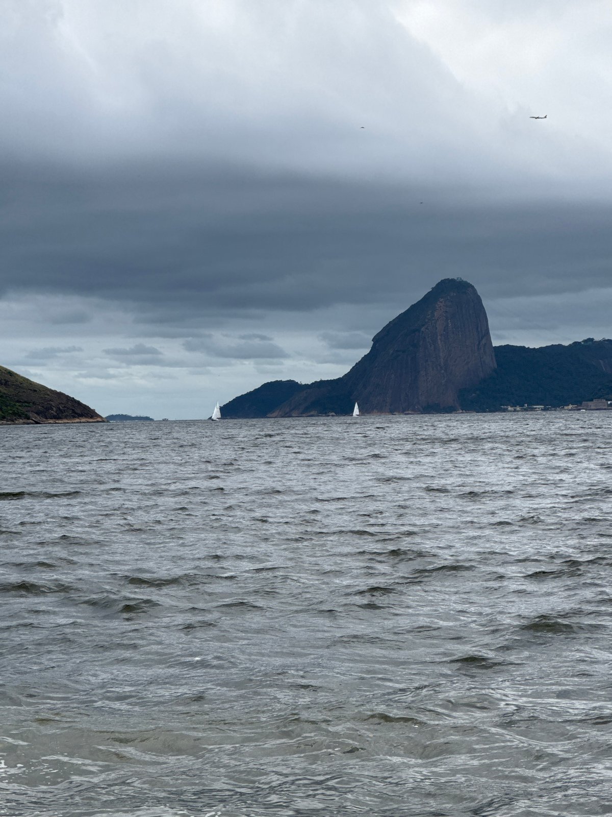 Sailboats on a grey Guanabara Bay, Niterói