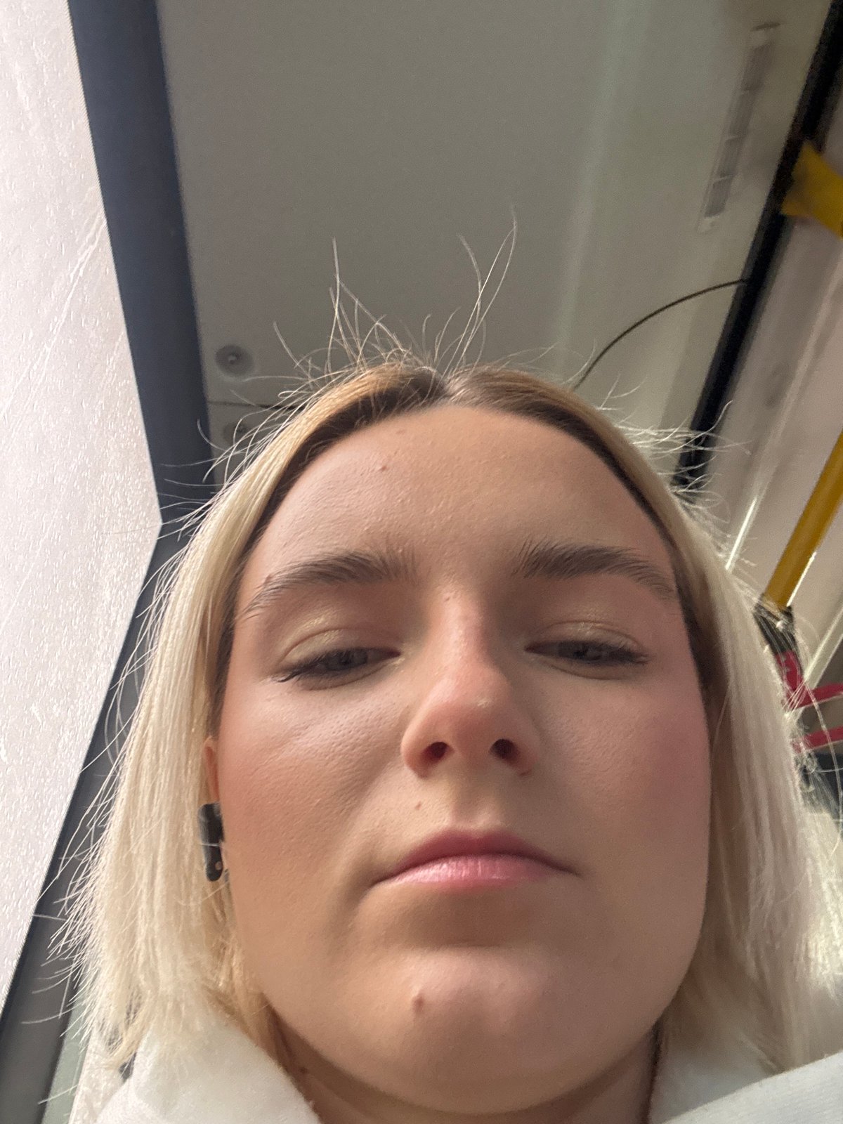 Woman takes early morning selfies on Saint Petersburg transit