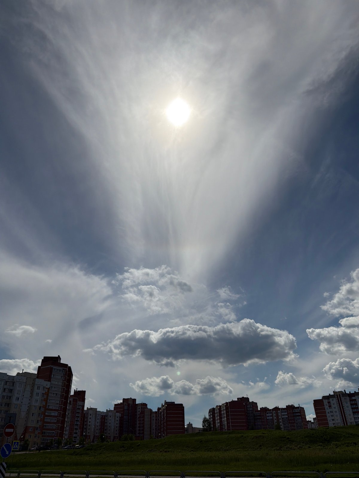 Spring walk through city captures dandelions, selfies, urban scenery