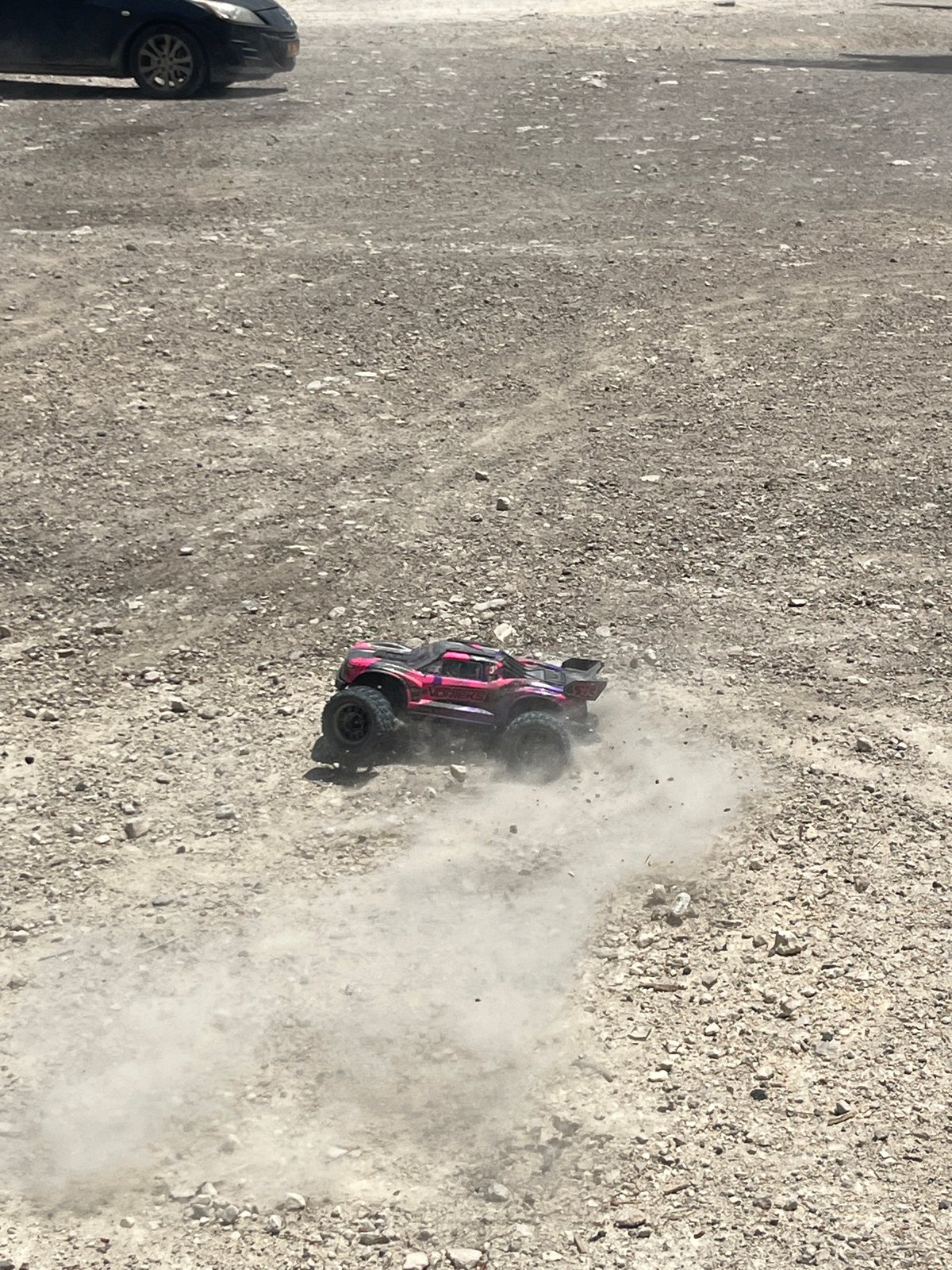 RC car spotted doing donuts in Israeli gravel lot