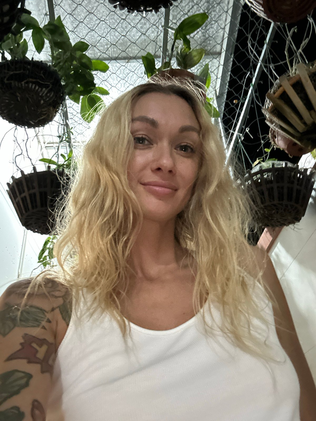Woman takes selfie in Vietnam showing tattoo