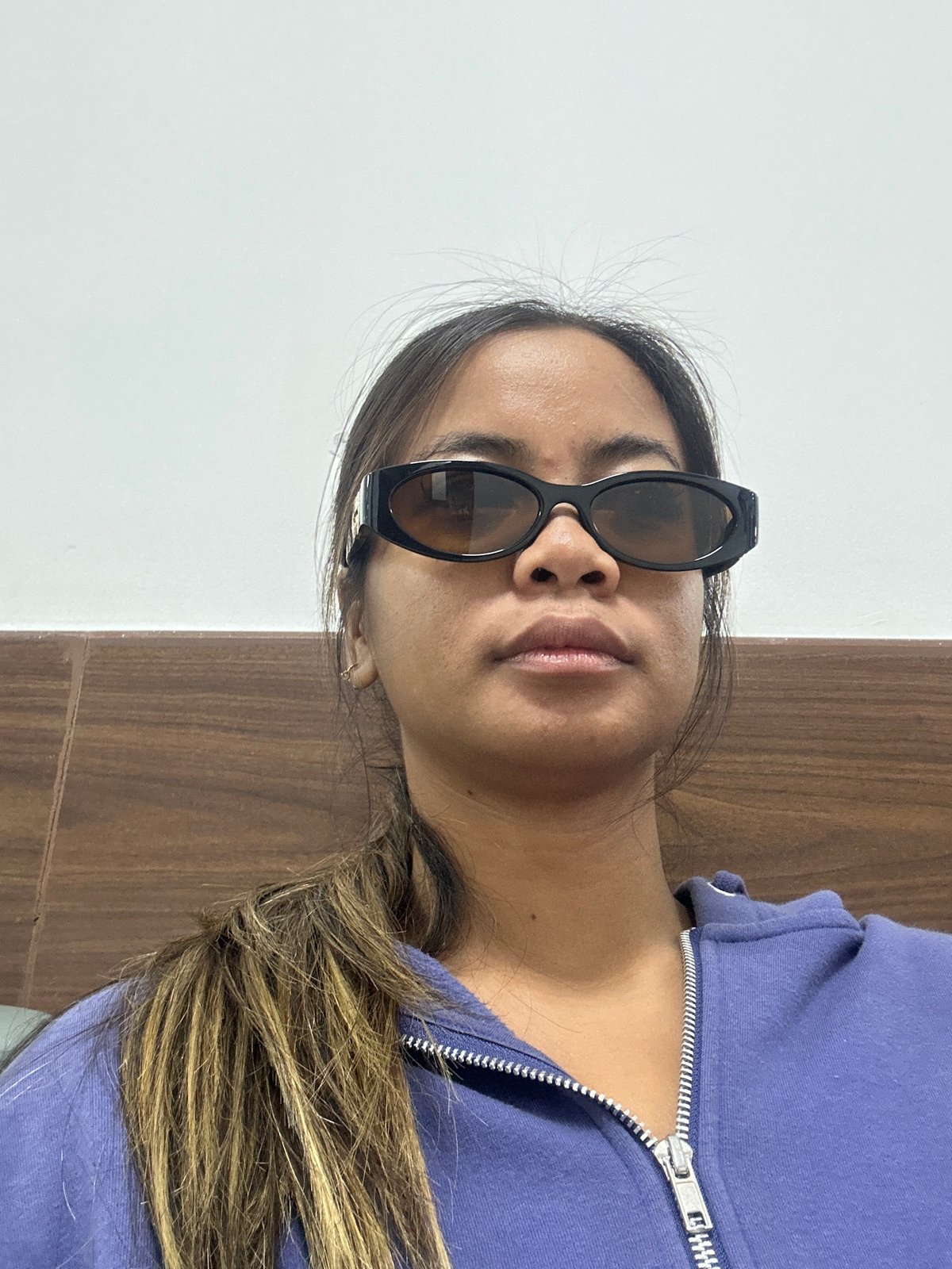 Woman takes selfie series in Kuta during early morning hours