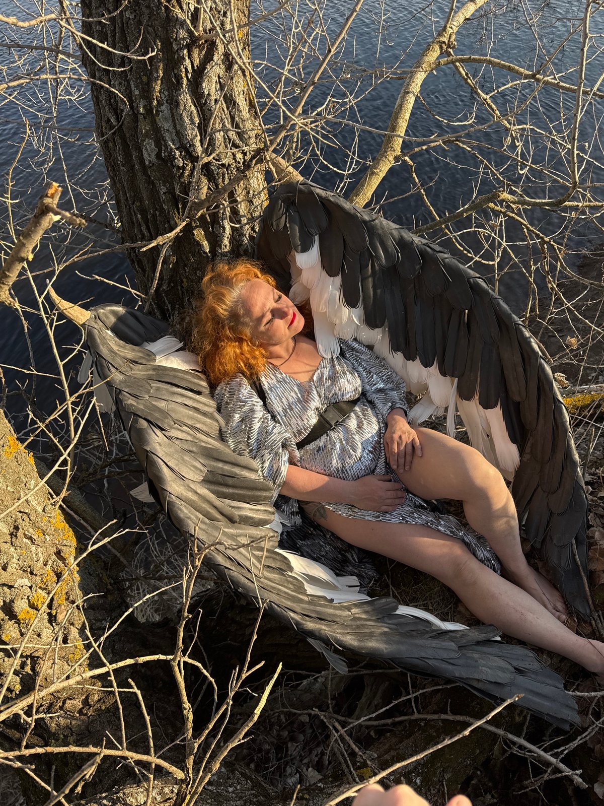 Artistic photo shoot with winged props captured in Noviy