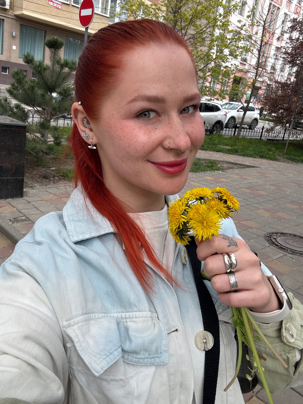 Boy with rainbow scarf visits fountain in Rostov-on-Don