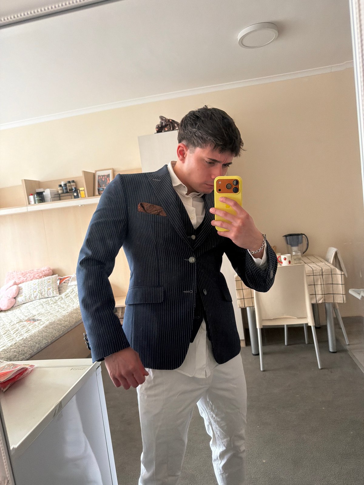 Person documents morning routine getting dressed in formal wear