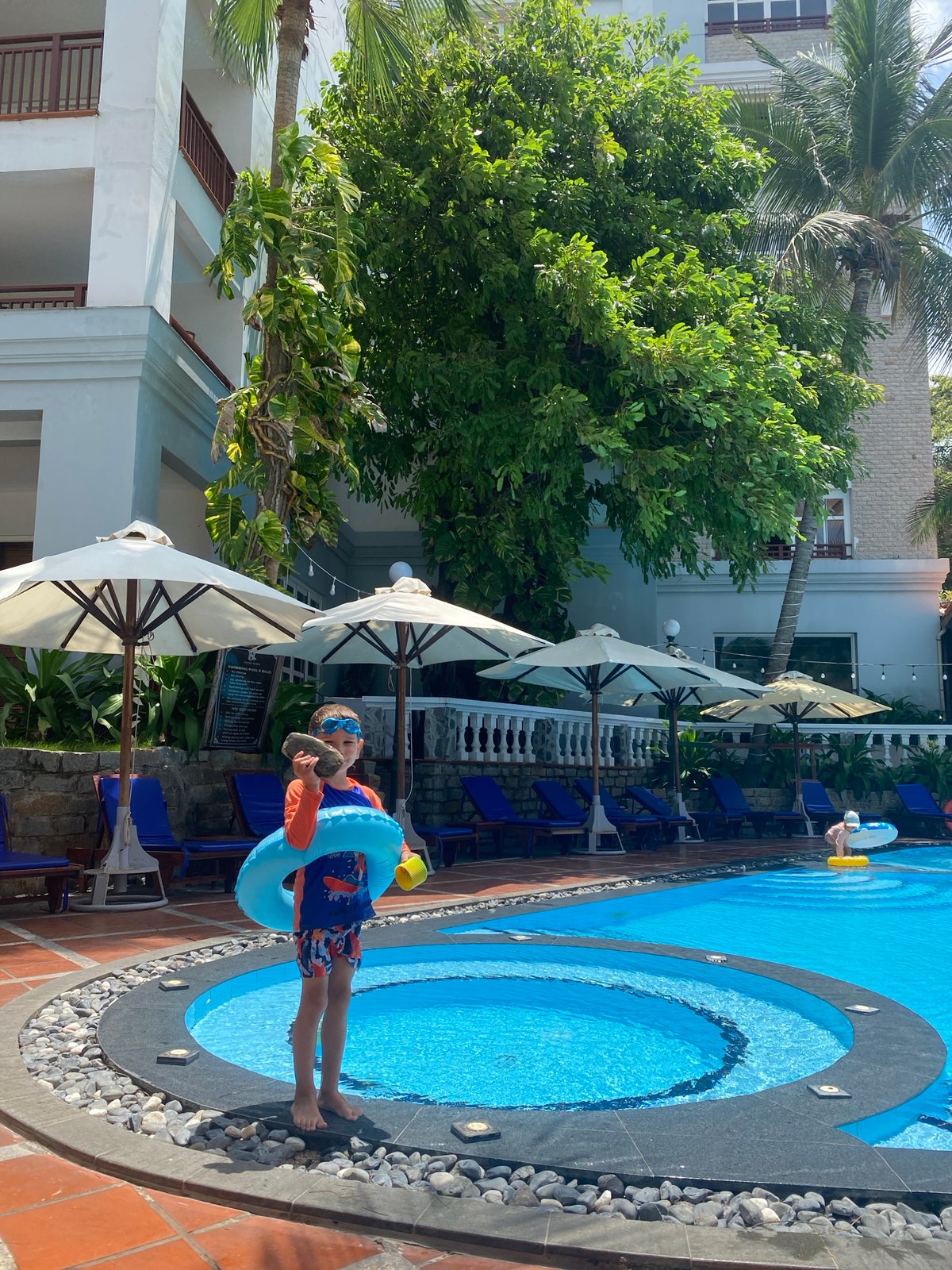 Beach and pool leisure activities documented in Phu Thuy Ward