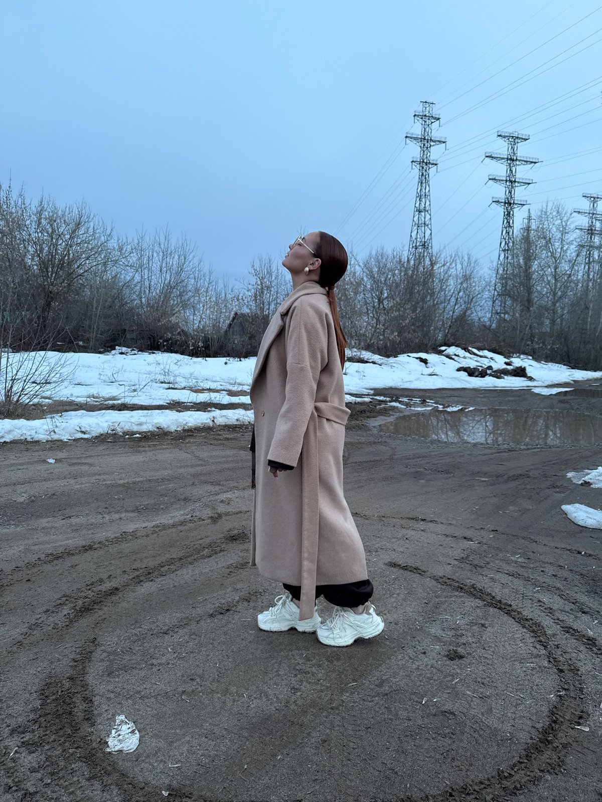 Woman photographs winter scenes around Chaikovsky, Russia