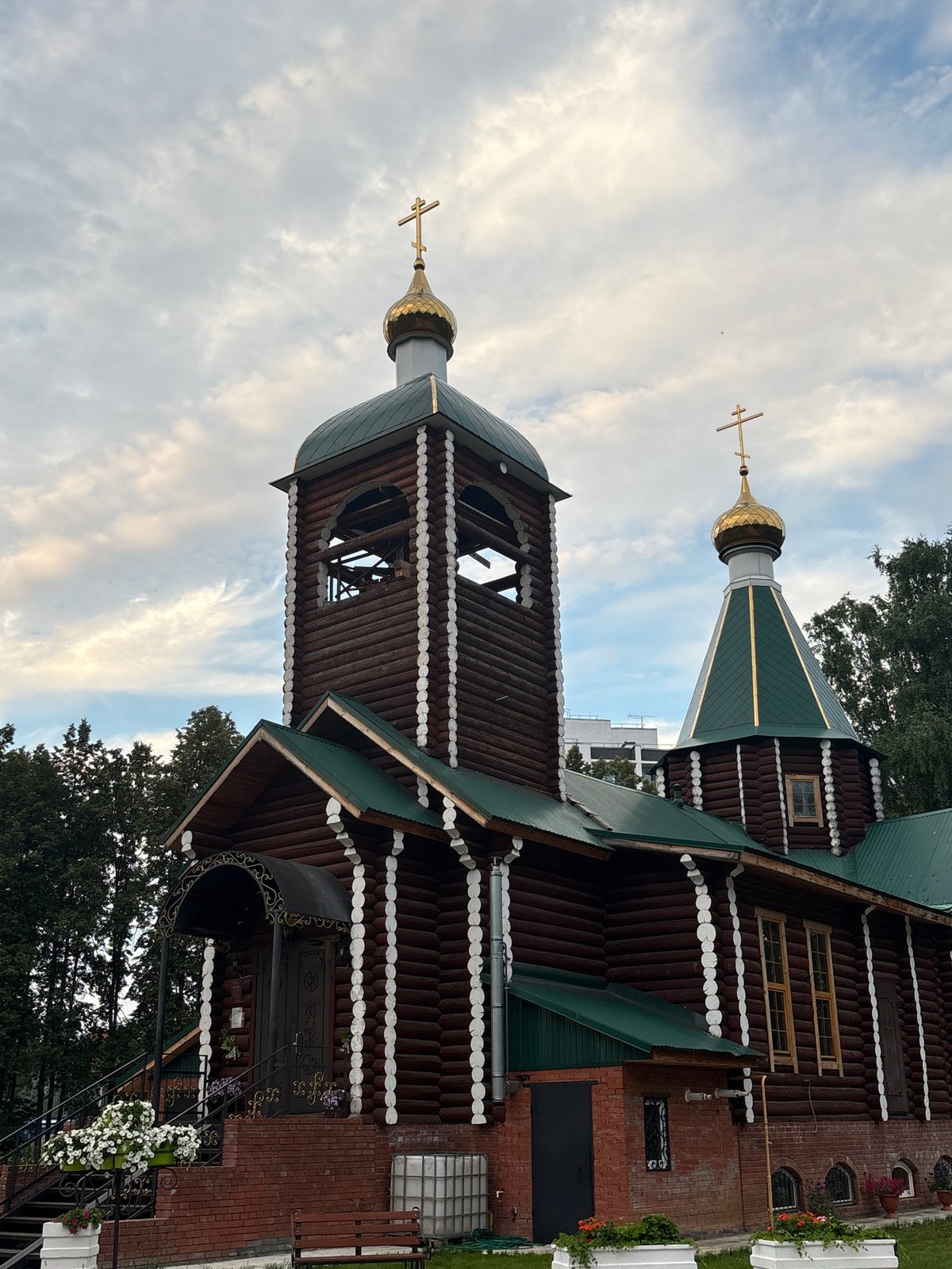 Afternoon walk around a wooden Orthodox church in Chaikovsky, Russia