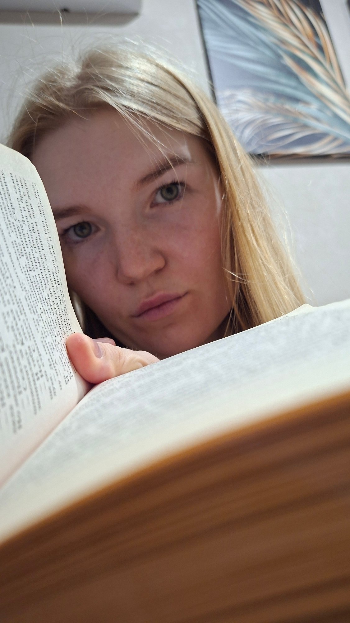 Quiet evening reading session with a Russian book in Chaikovsky