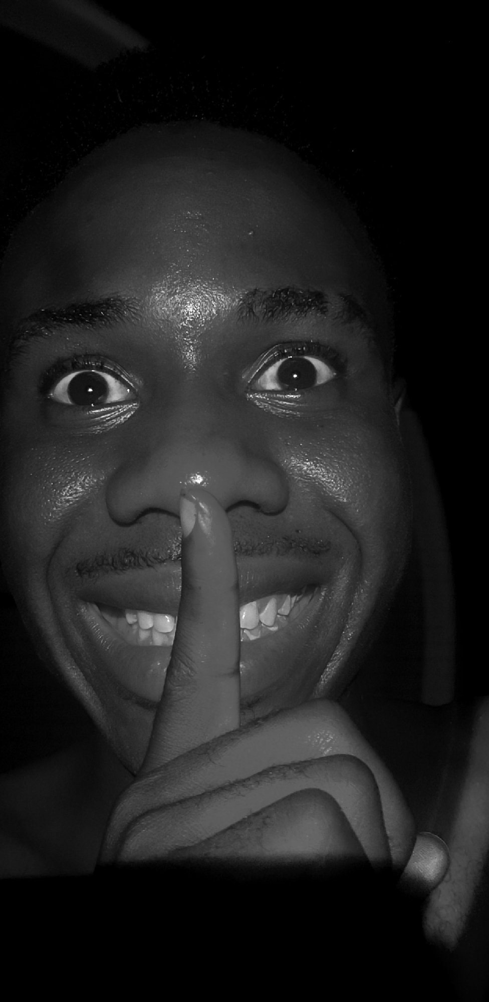 Late-night portrait session near a recording setup in Narayi