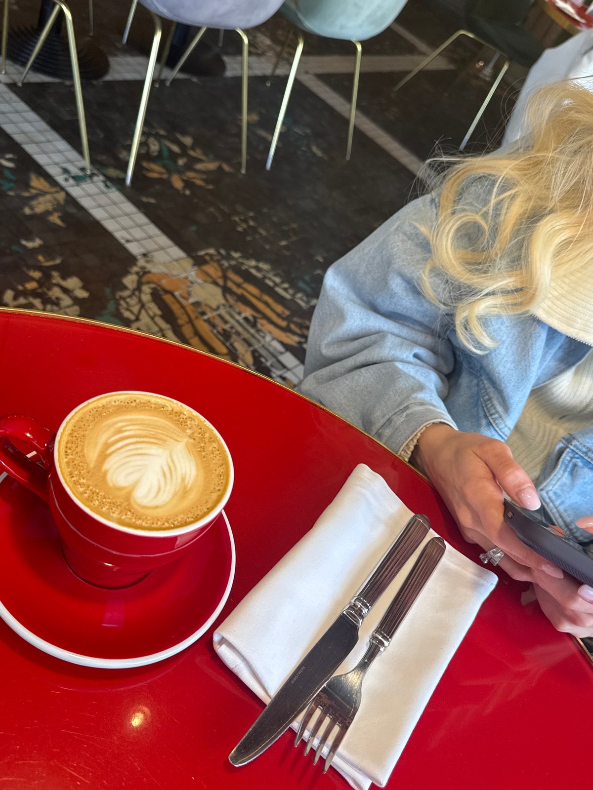 Woman enjoys breakfast at Moscow cafe Friday morning