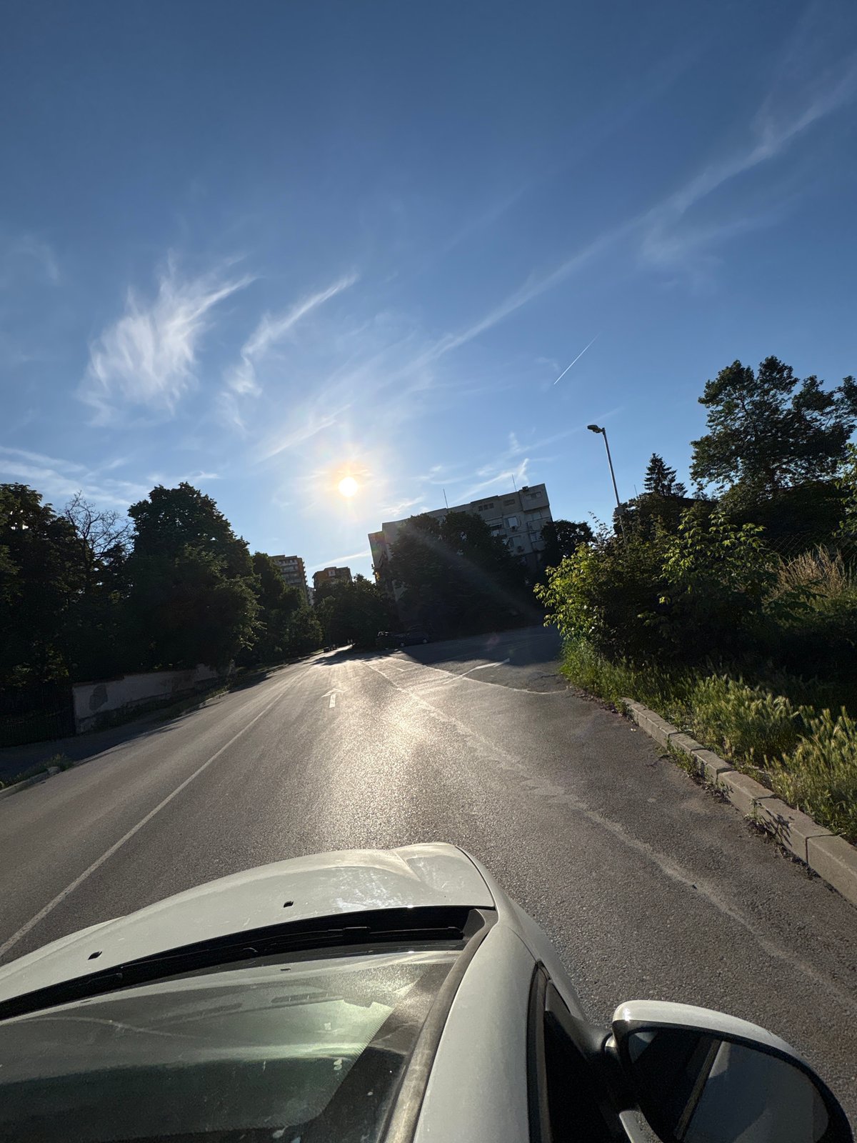 Motorist captures sunny afternoon drive through Vratsa, Bulgaria streets