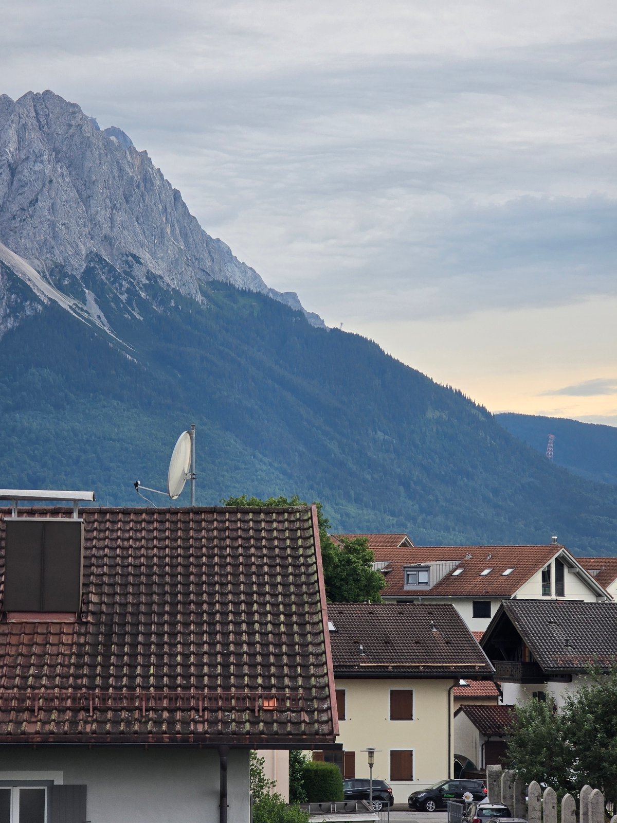 Bavarian Alps looming over Garmisch-Partenkirchen on an overcast evening