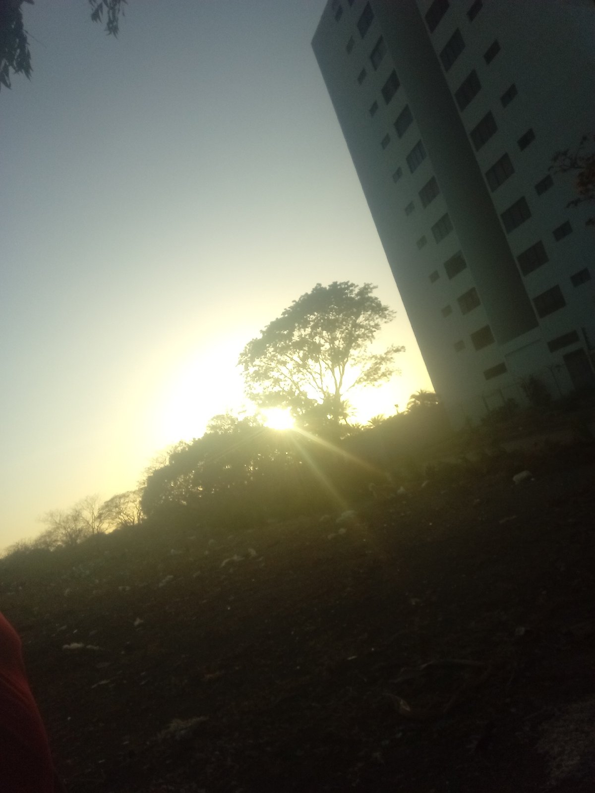 Hazy sunset captured from ground level in Juan Griego
