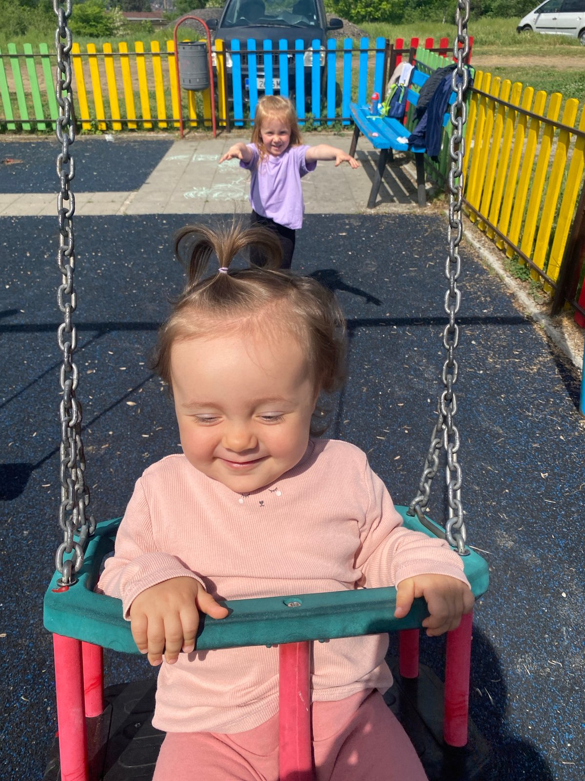 Child plays on swings at Blagoevgrad playground
