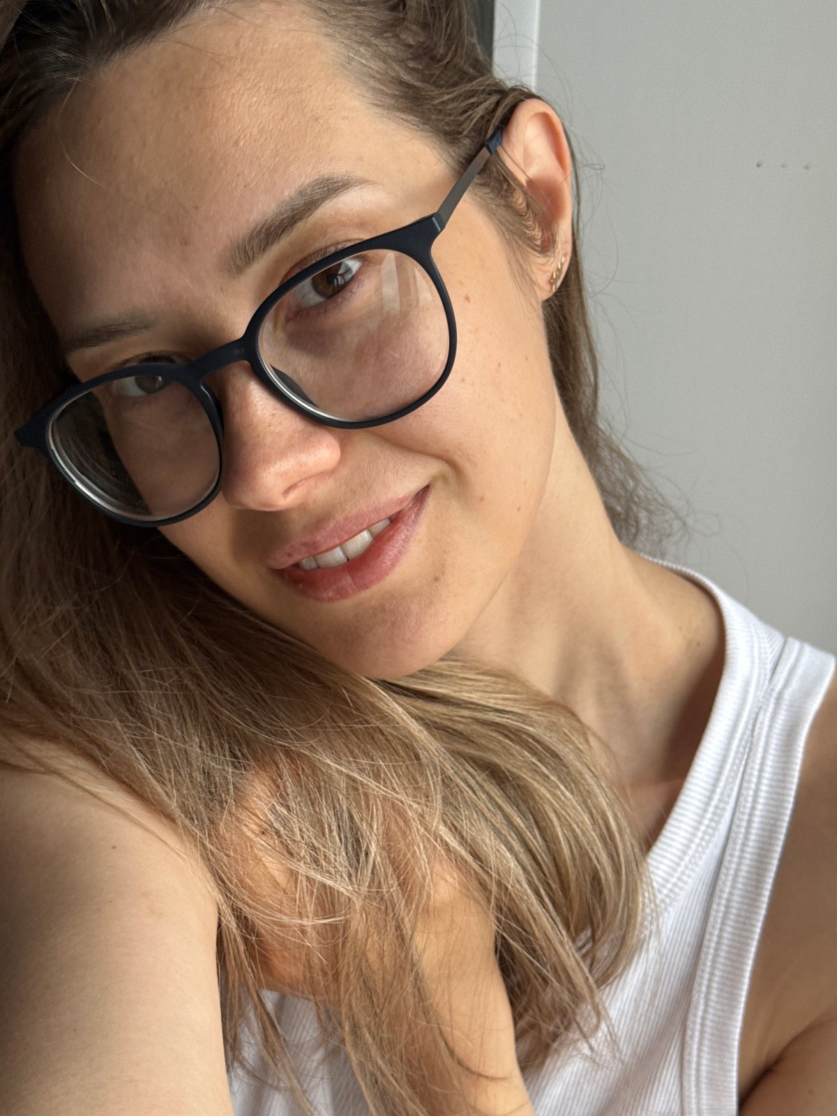 Woman enjoys morning coffee at home in Chaikovsky