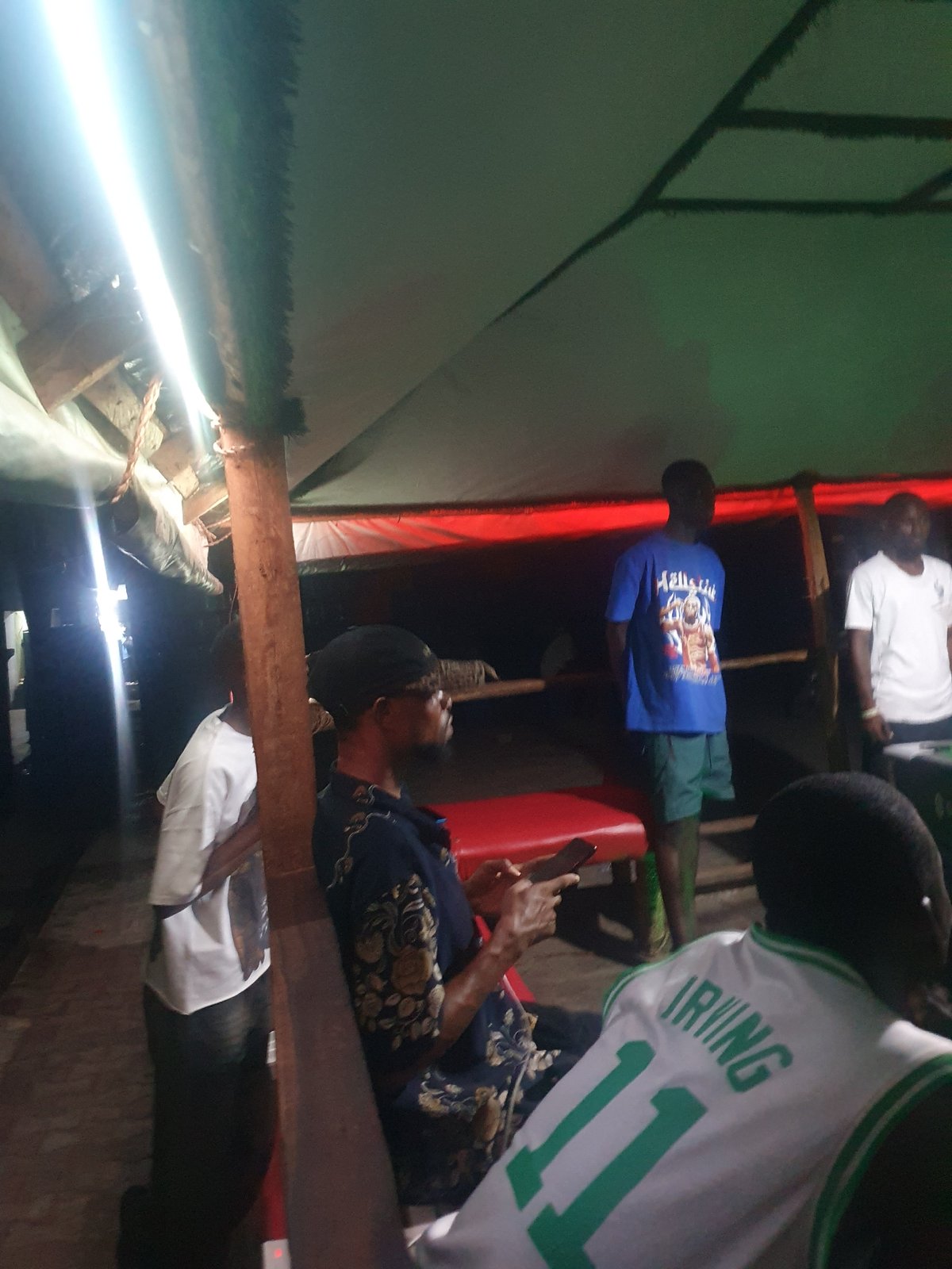 Evening recreation captured in Lokoja: pool games, TV watching