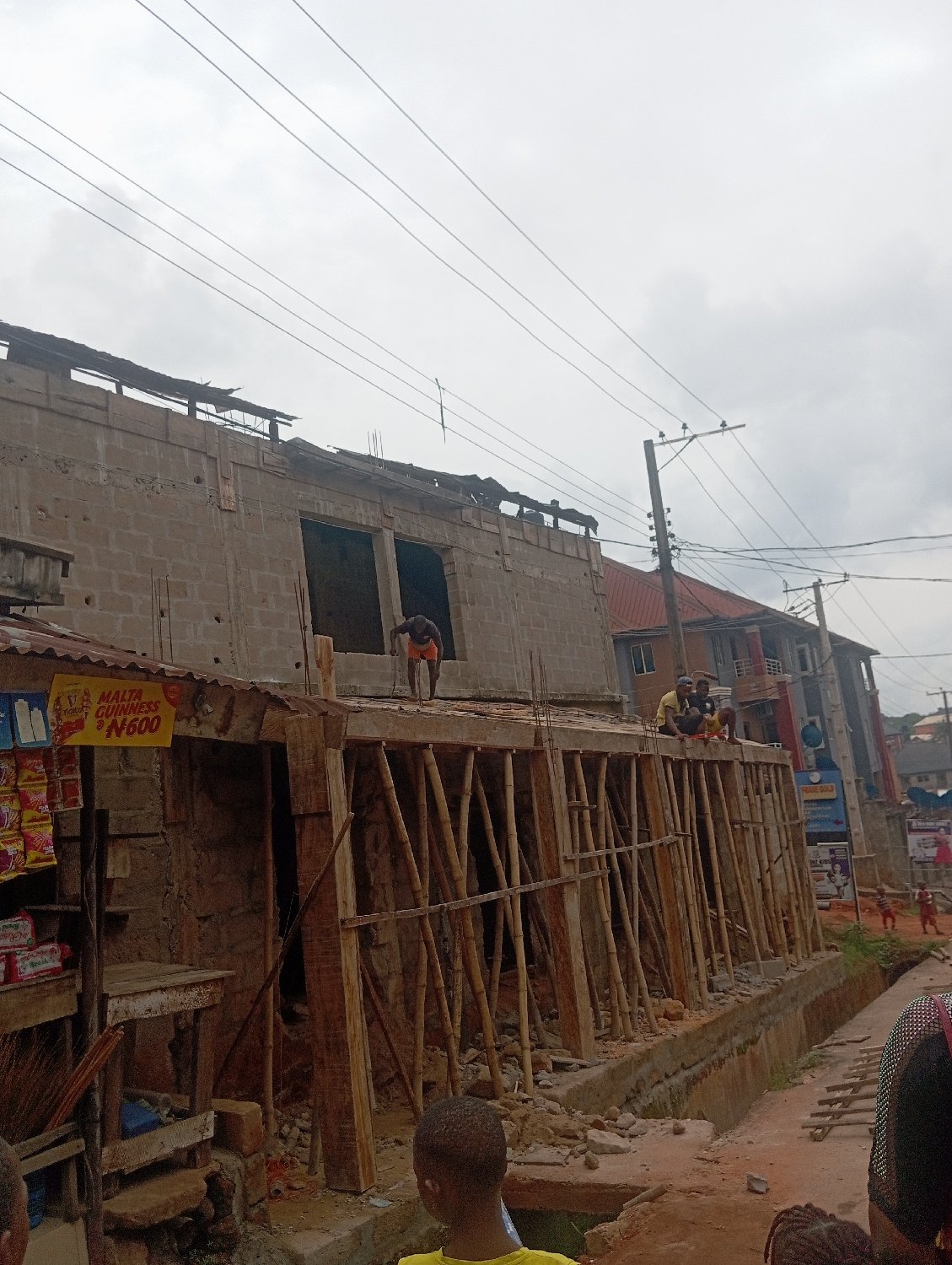 Overcast morning street life documented across Nkpor, Nigeria