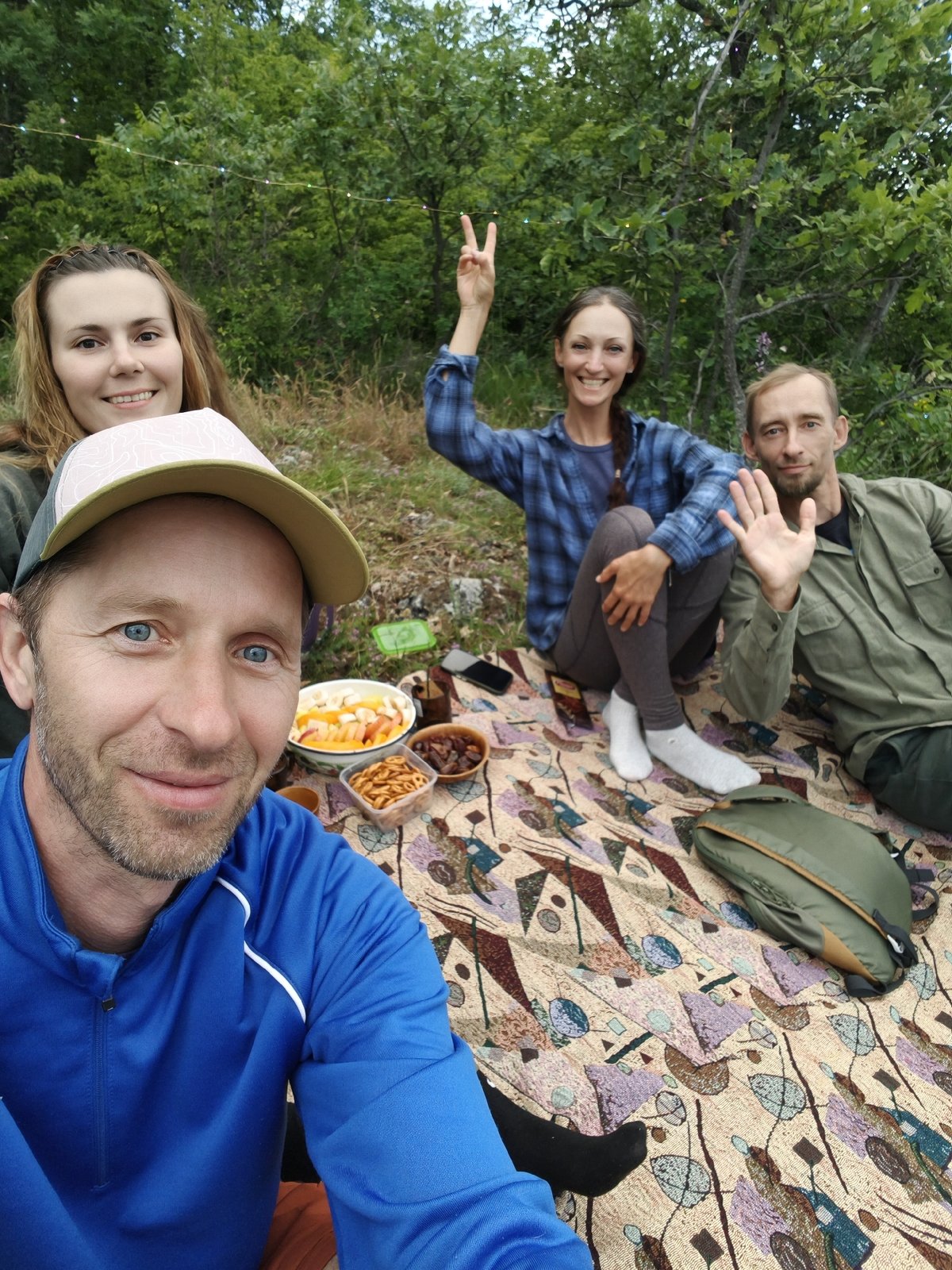 Picnic gathering documented under cloudy skies in coastal Ukraine