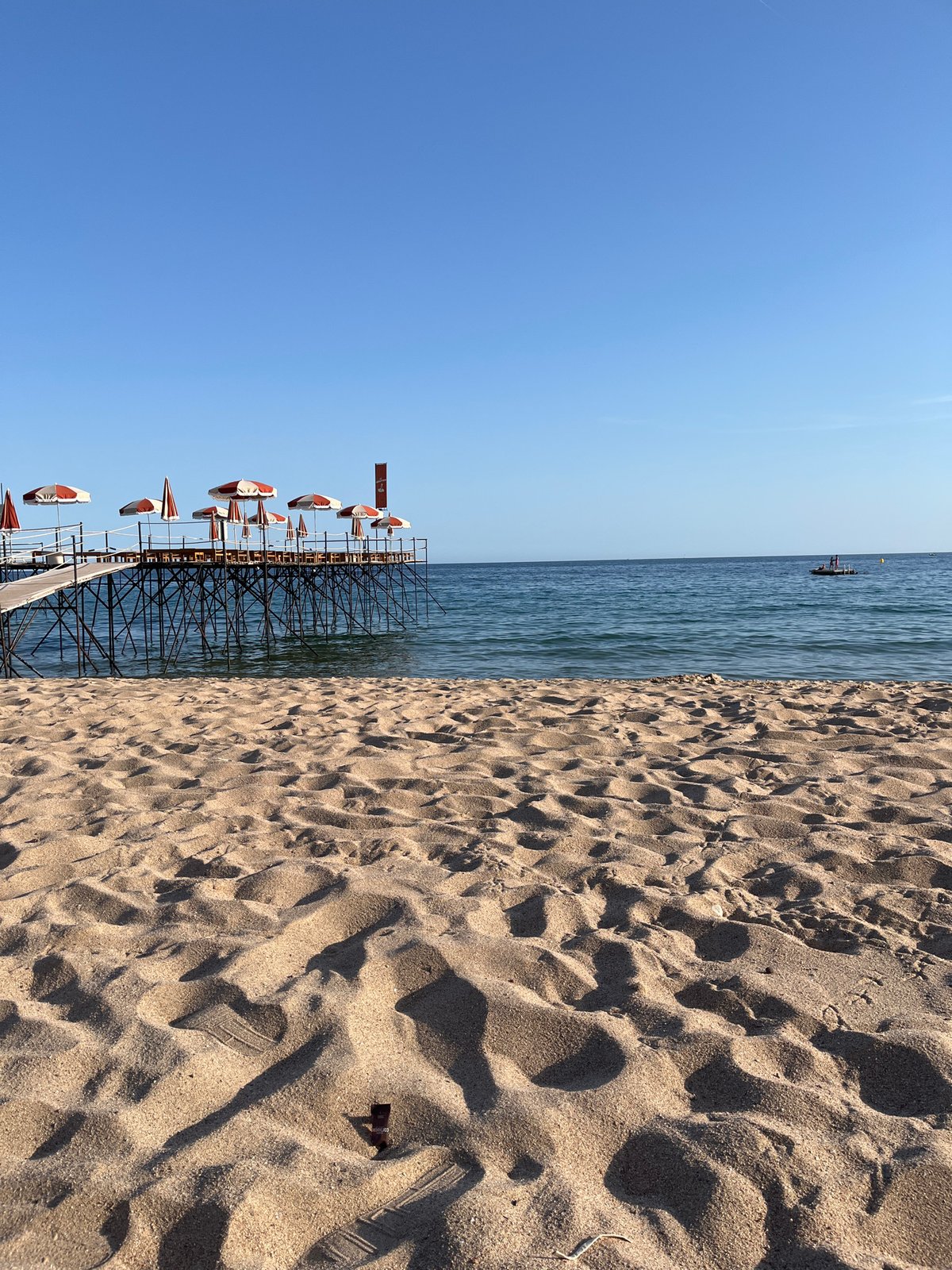 Lazy afternoon on the Cannes beach, drinks and sunshine