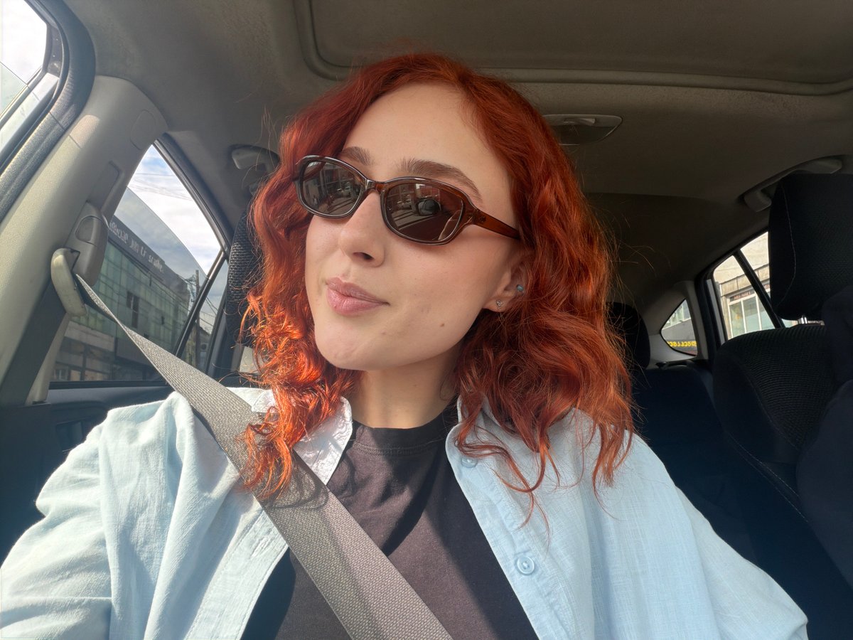 Red-haired individual captures selfies, dines in Tbilisi
