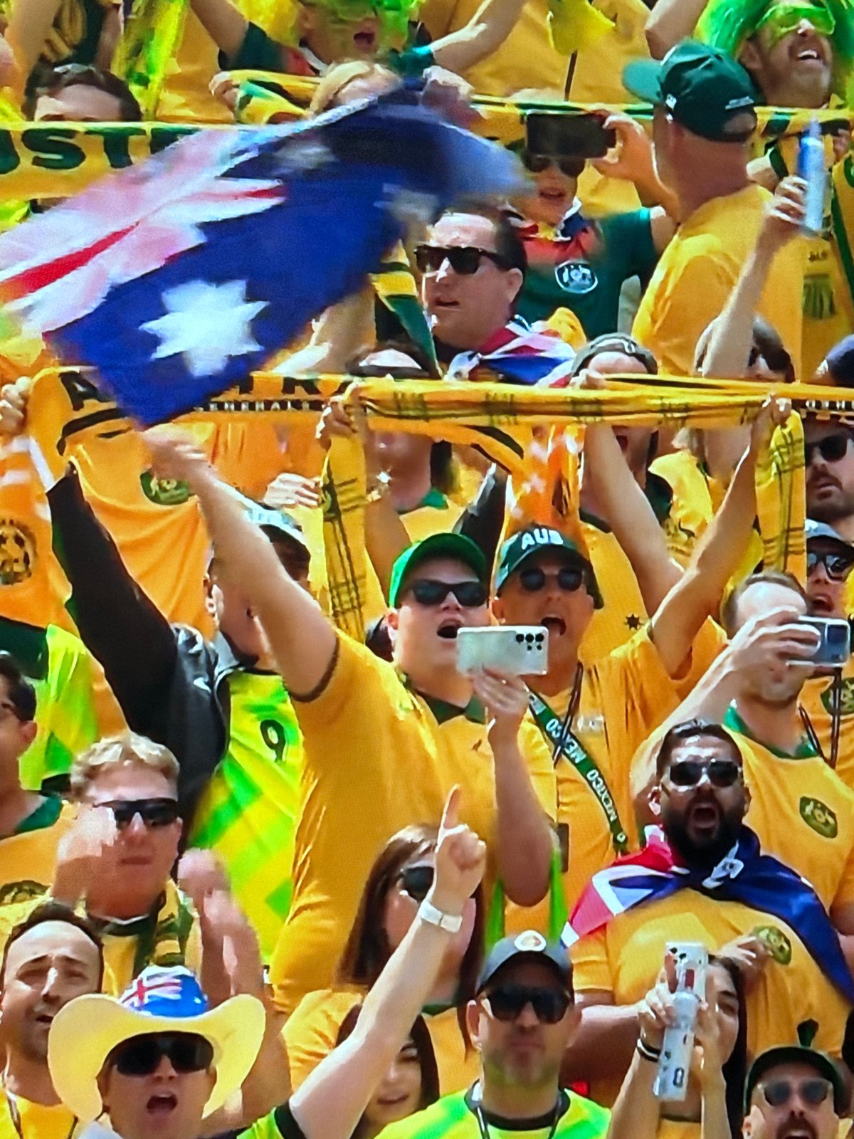 Unrelated snapshots: soccer crowds, huskies, helicopters, and a drink