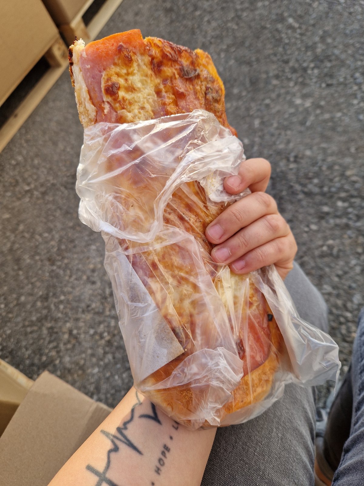 Boxes on pallets and a pizza slice, Bahovitsa