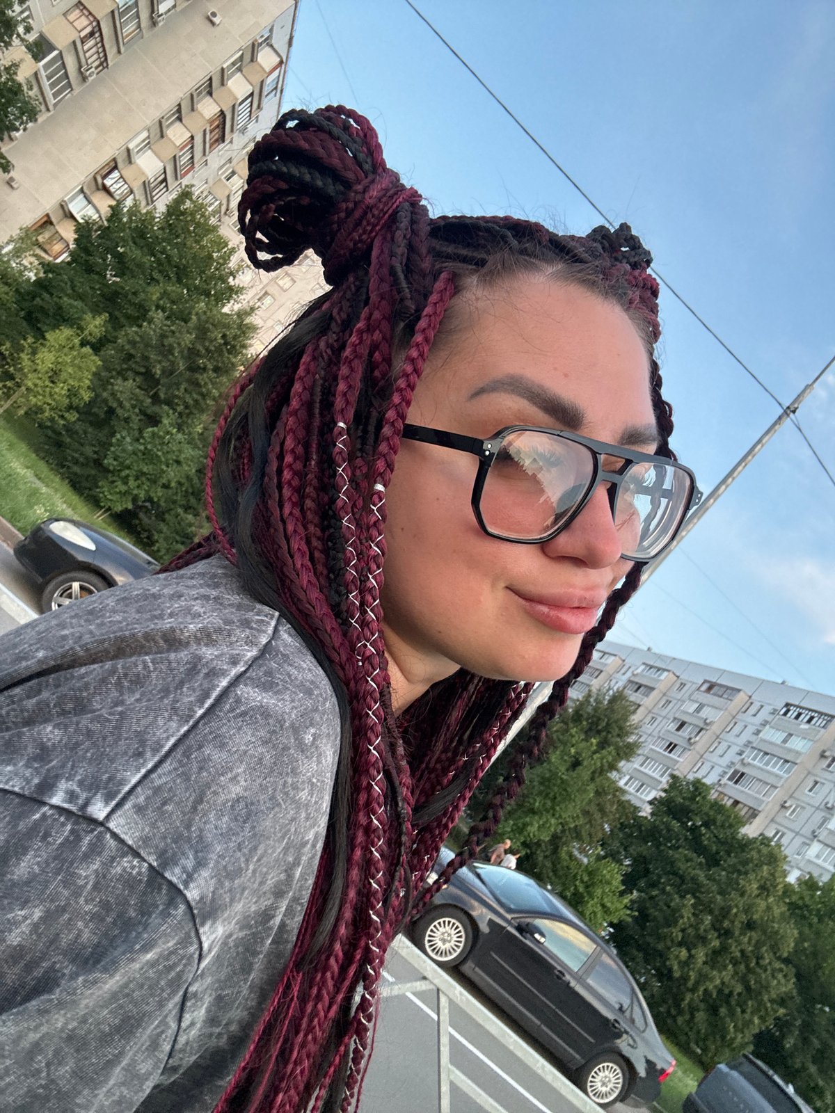 Selfie session on a Tolyatti street at golden hour